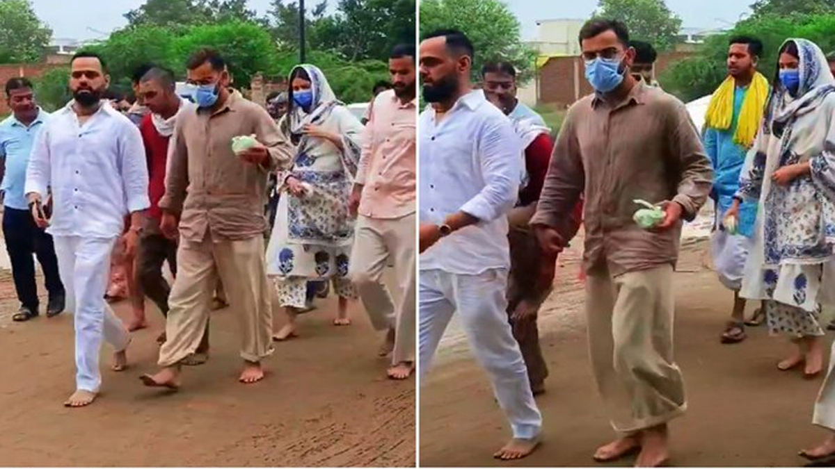 బురదలో చెప్పుల్లేకుండా నడిచిన విరాట్, అనుష్క!